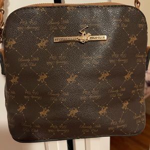 Brown color polo handbag